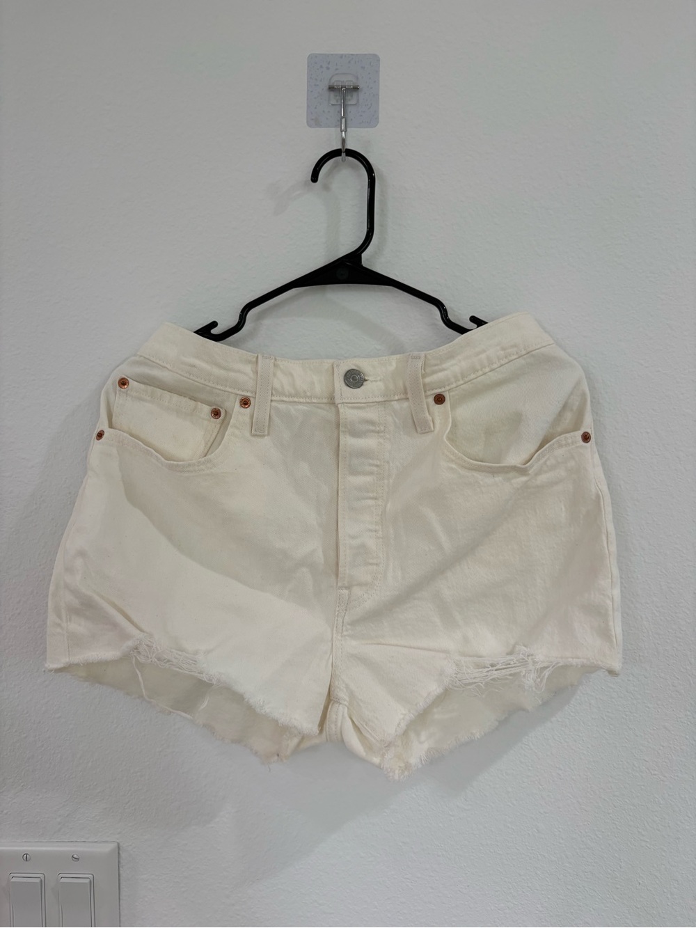 Levi's Cream Denim High-Rise Cutoff Shorts